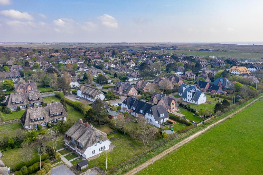 an aerial view of a residential neighborhood with houses at Westerhoern 46 Haus 2 App 24 in Keitum