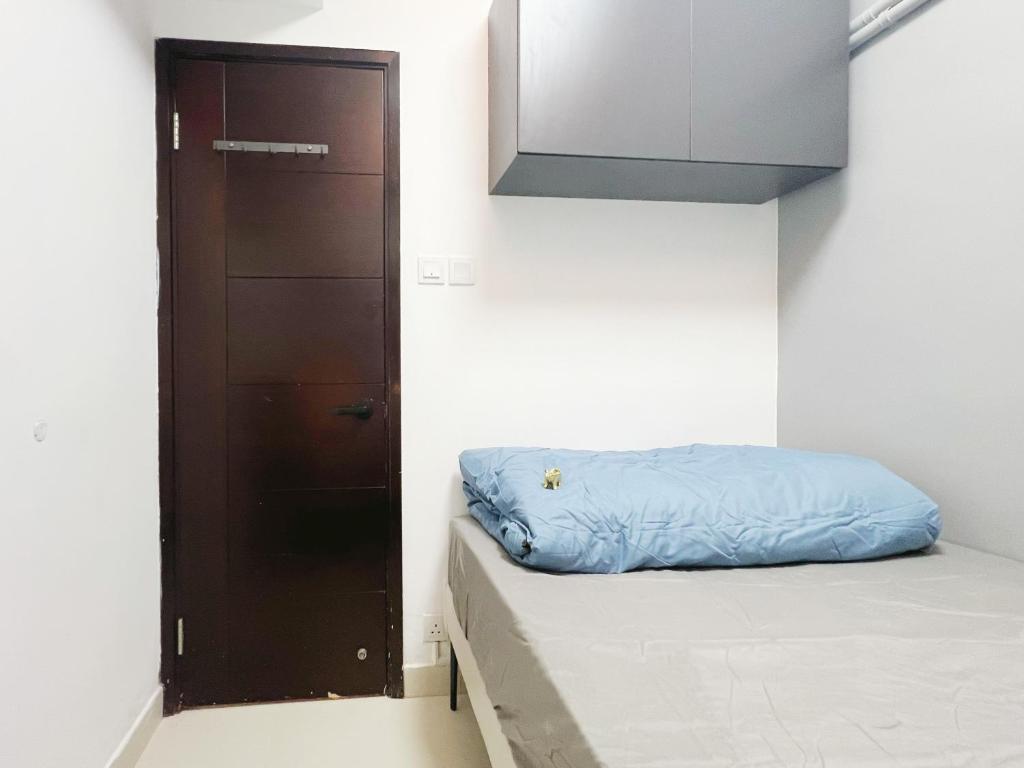 Rúm í herbergi á Student Accommodation - 5 Man Cheong Street