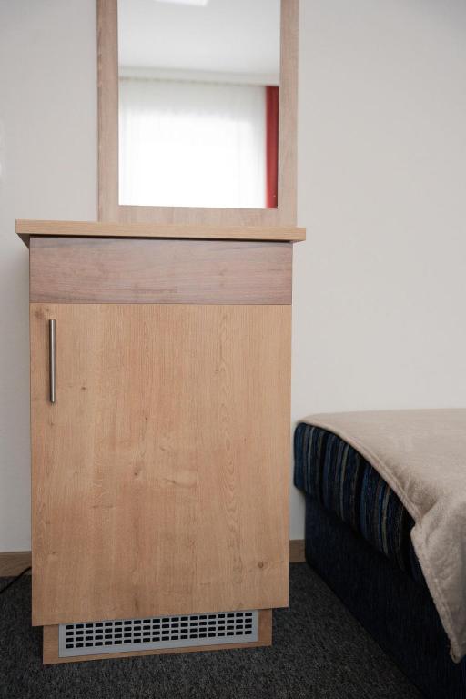 Postel nebo postele na pokoji v ubytování Frühstückspension Auer - Haus Kargl