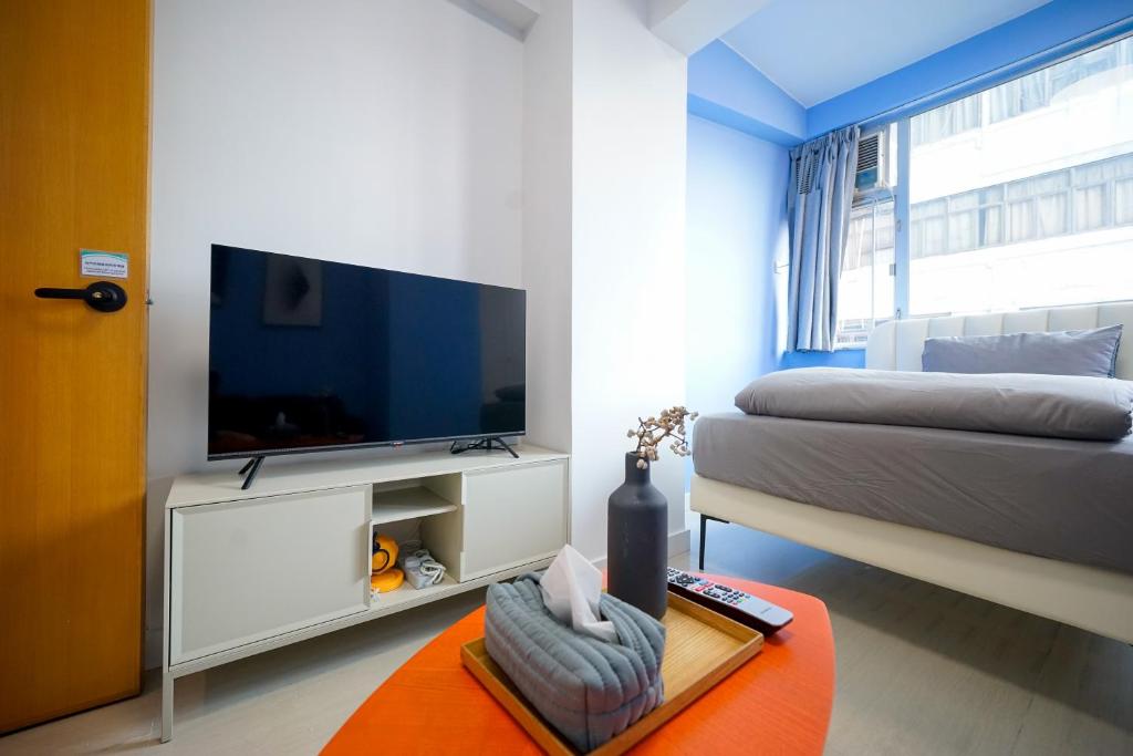 Una televisión o centro de entretenimiento en Student Accommodation - 276 Gloucester Road