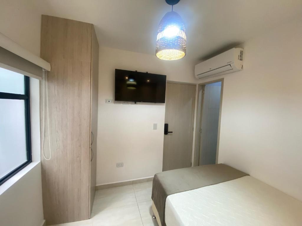 Postel nebo postele na pokoji v ubytování Maidy Luxury Hotel