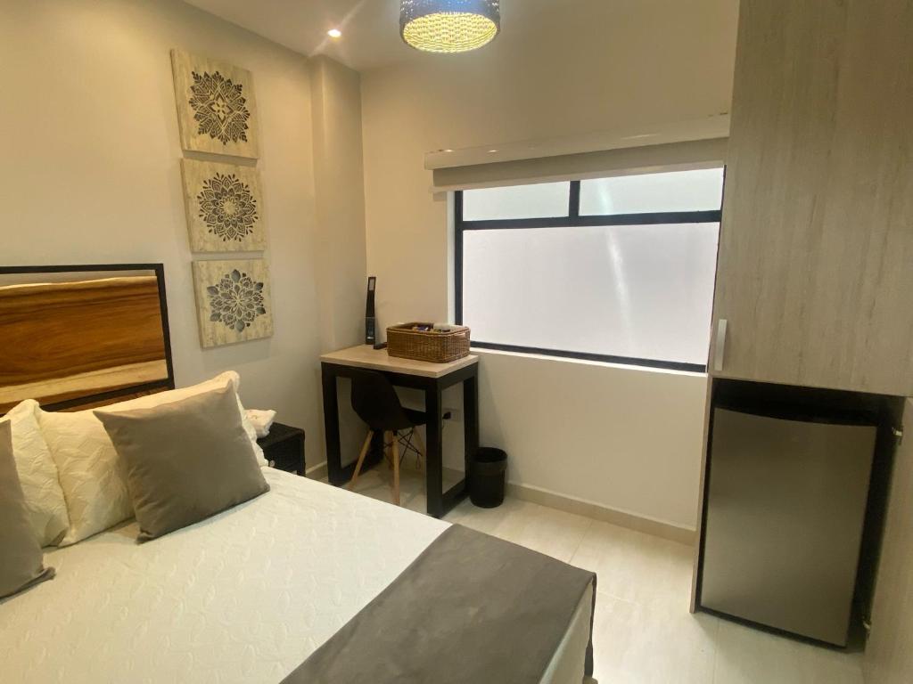 Postel nebo postele na pokoji v ubytování Maidy Luxury Hotel
