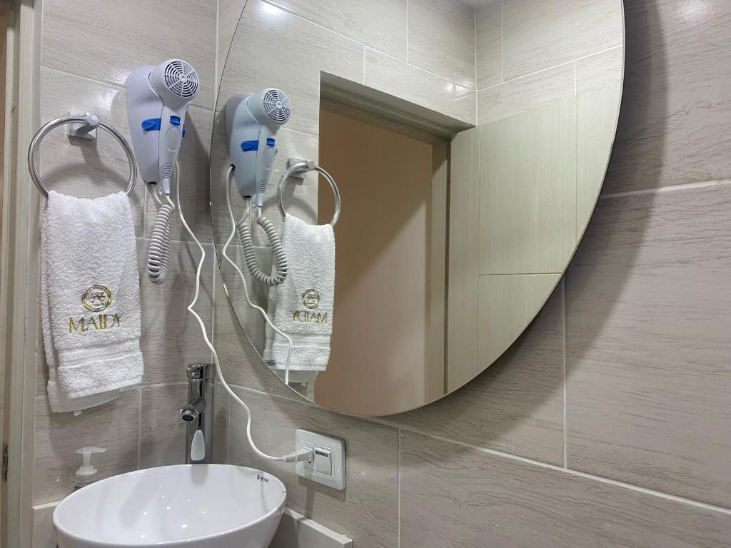 Koupelna v ubytování Maidy Luxury Hotel