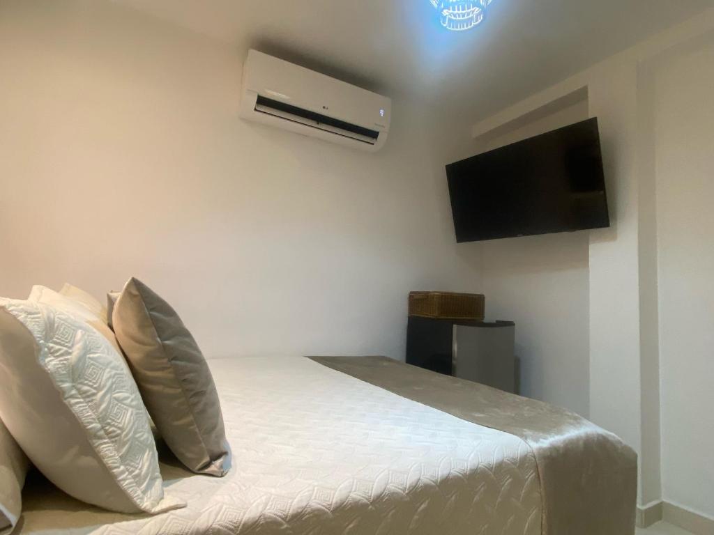 TV a/nebo společenská místnost v ubytování Maidy Luxury Hotel