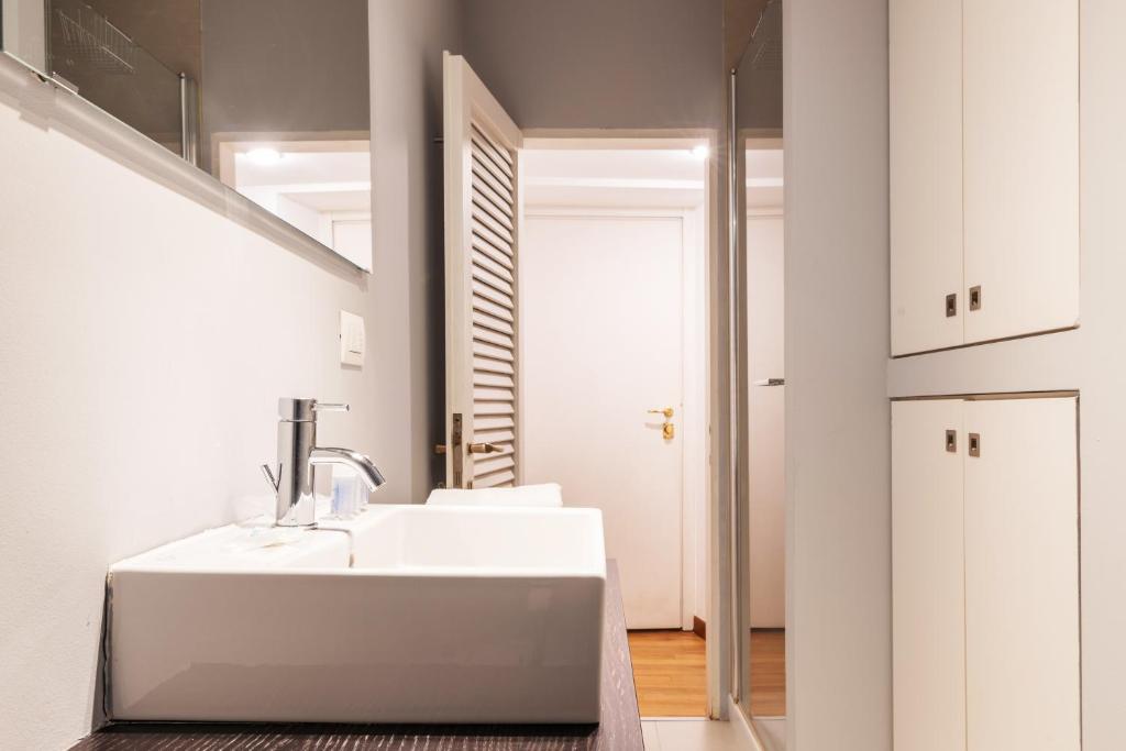 Posteľ alebo postele v izbe v ubytovaní easyhomes - Spiga Suite