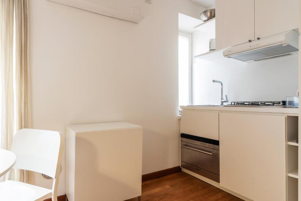 Kuchyňa alebo kuchynka v ubytovaní easyhomes - Spiga Suite