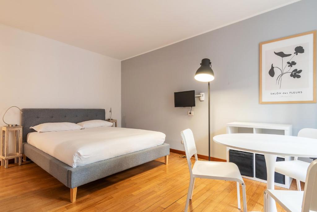 Posteľ alebo postele v izbe v ubytovaní easyhomes - Spiga Suite