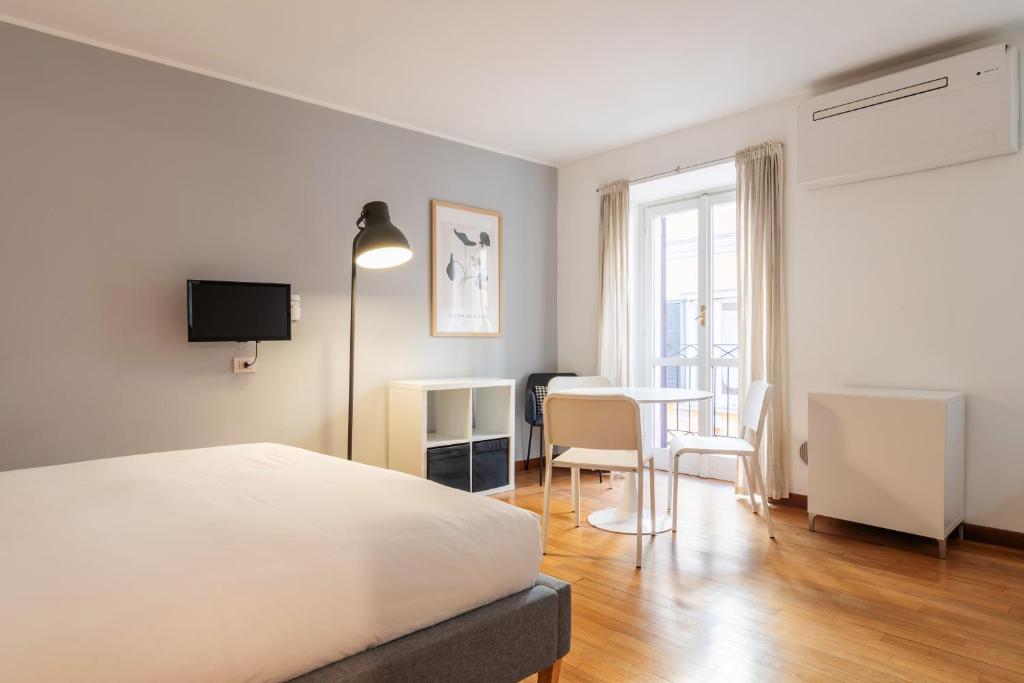 Televízia a/alebo spoločenská miestnosť v ubytovaní easyhomes - Spiga Suite