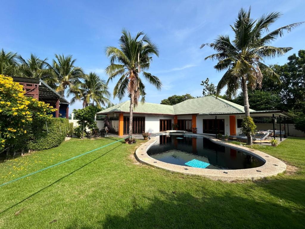 Bazén v ubytování Hua Hin Oasis nebo v jeho okolí