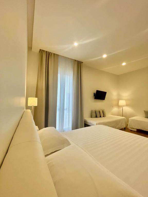 Postel nebo postele na pokoji v ubytování Blanco B&B - Group