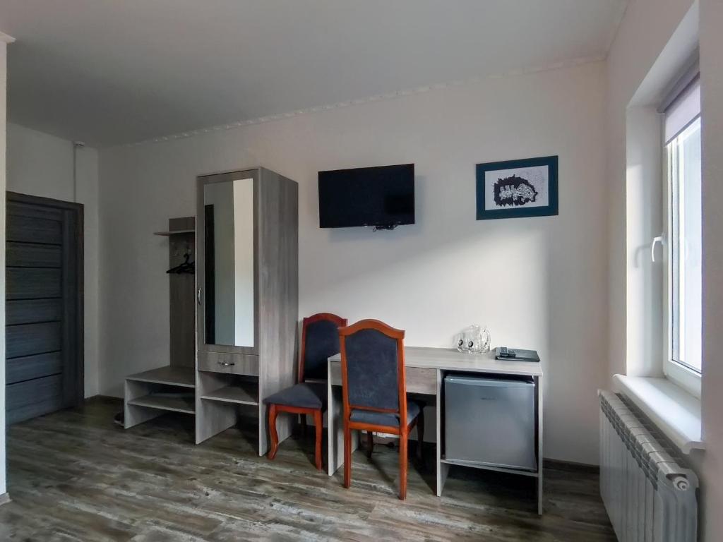 TV a/nebo společenská místnost v ubytování Готель Ципа