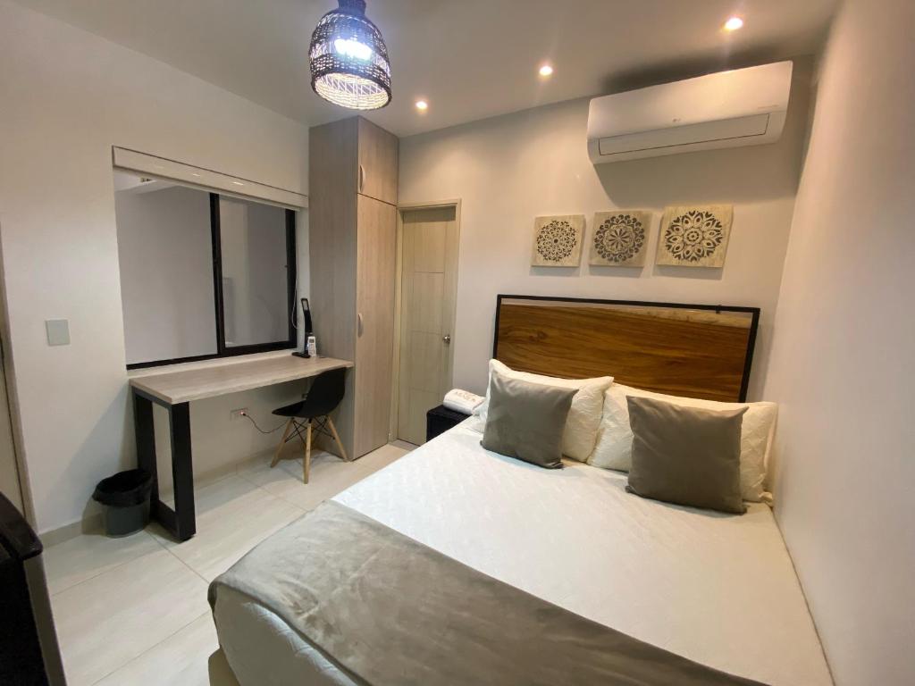 Postel nebo postele na pokoji v ubytování Maidy Luxury Hotel