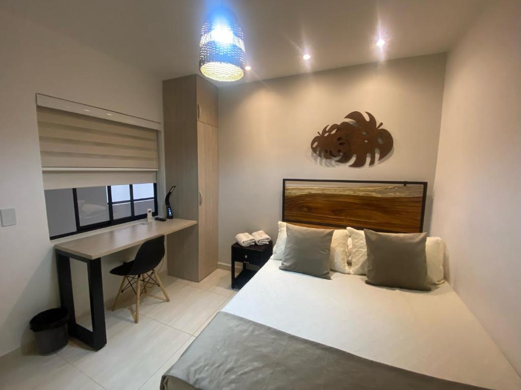 Postel nebo postele na pokoji v ubytování Maidy Luxury Hotel