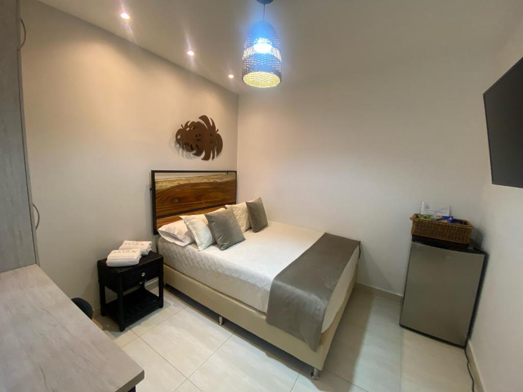 Postel nebo postele na pokoji v ubytování Maidy Luxury Hotel
