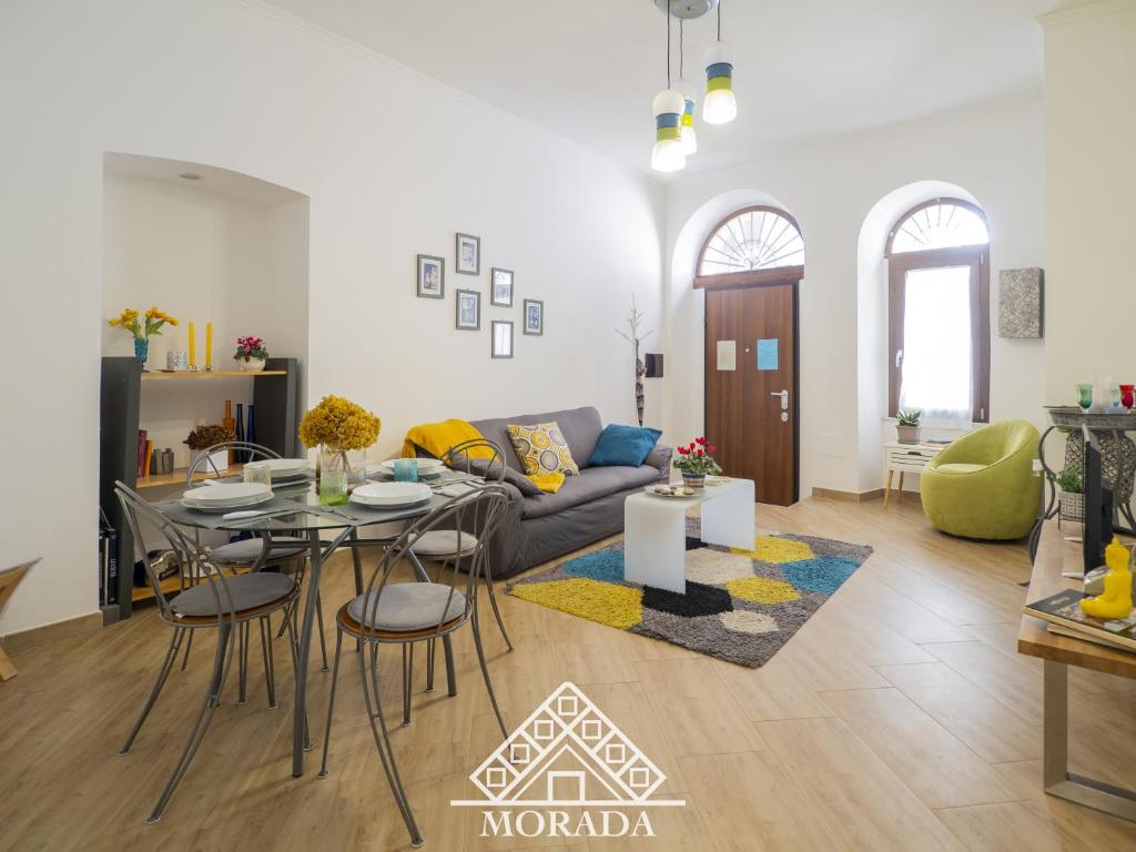 a living room with a couch and a table at Casa Anacleto in Iglesias