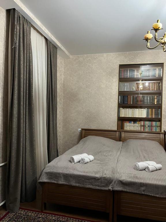 Postel nebo postele na pokoji v ubytování Lia Khaikashvili Guest House
