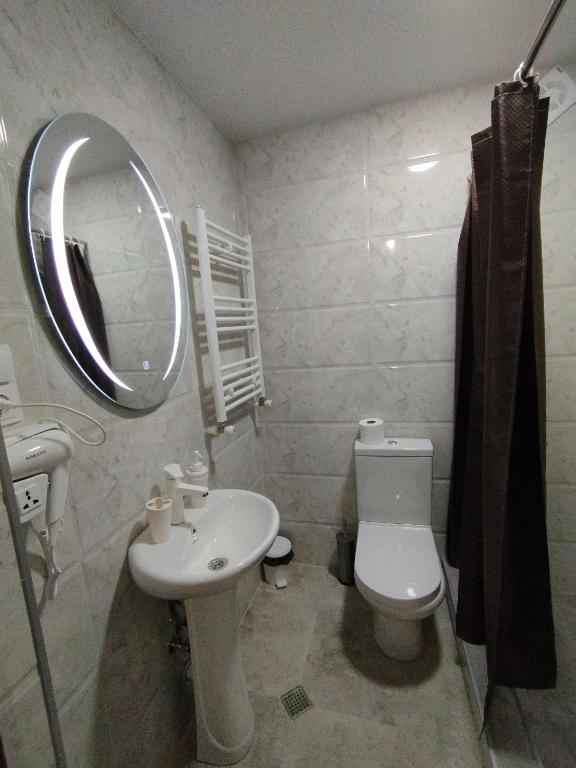 Koupelna v ubytování Guest House Mtisubani