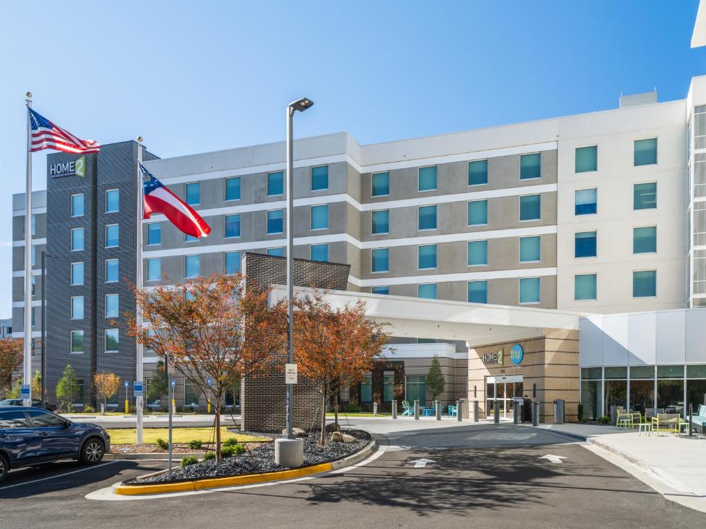 a rendering of the front of a hotel at Home2 Suites By Hilton Atlanta Airport College Park in Atlanta
