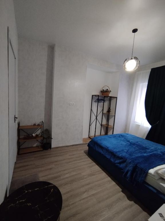 Postel nebo postele na pokoji v ubytování Guest House Mtisubani