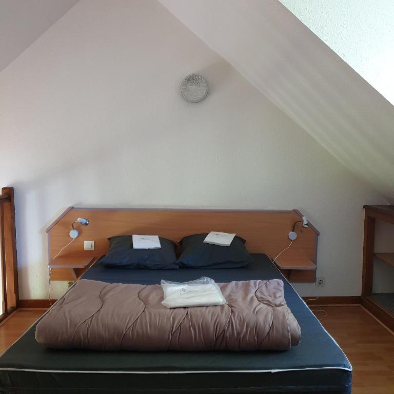 Postel nebo postele na pokoji v ubytování Camping Pyrénées Nature
