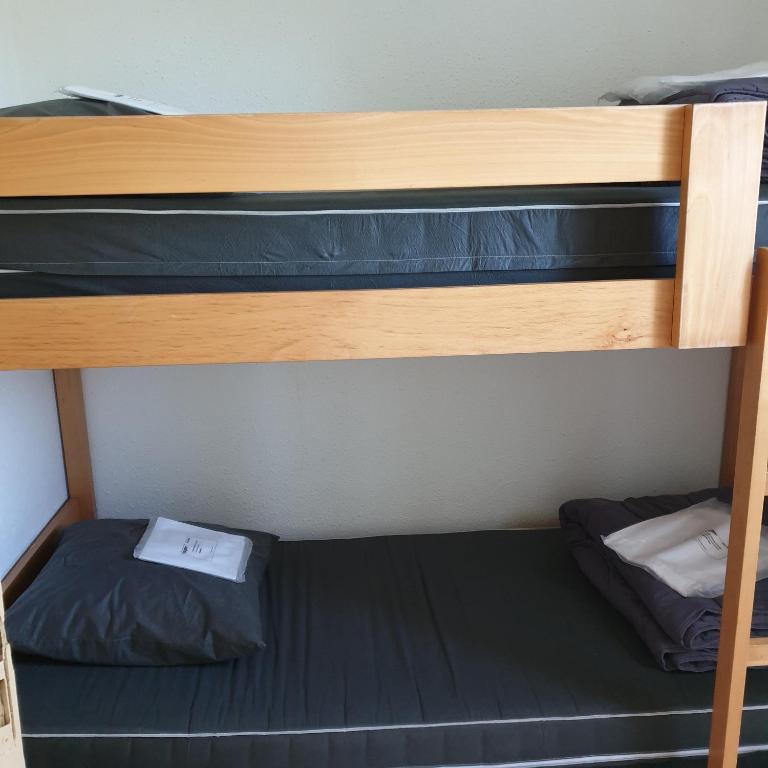 Postel nebo postele na pokoji v ubytování Camping Pyrénées Nature