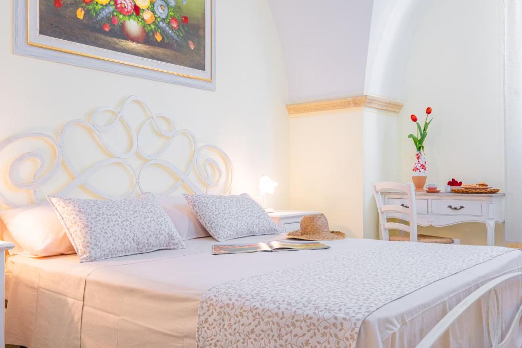 Postel nebo postele na pokoji v ubytování Villa VentoSolare Luxury - Specchia