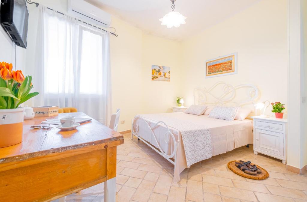 Postel nebo postele na pokoji v ubytování Villa VentoSolare Luxury - Specchia