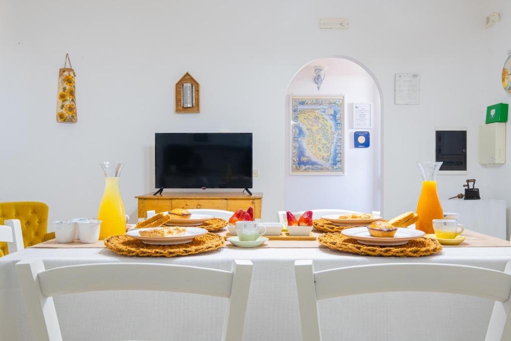 TV a/nebo společenská místnost v ubytování Villa VentoSolare Luxury - Specchia