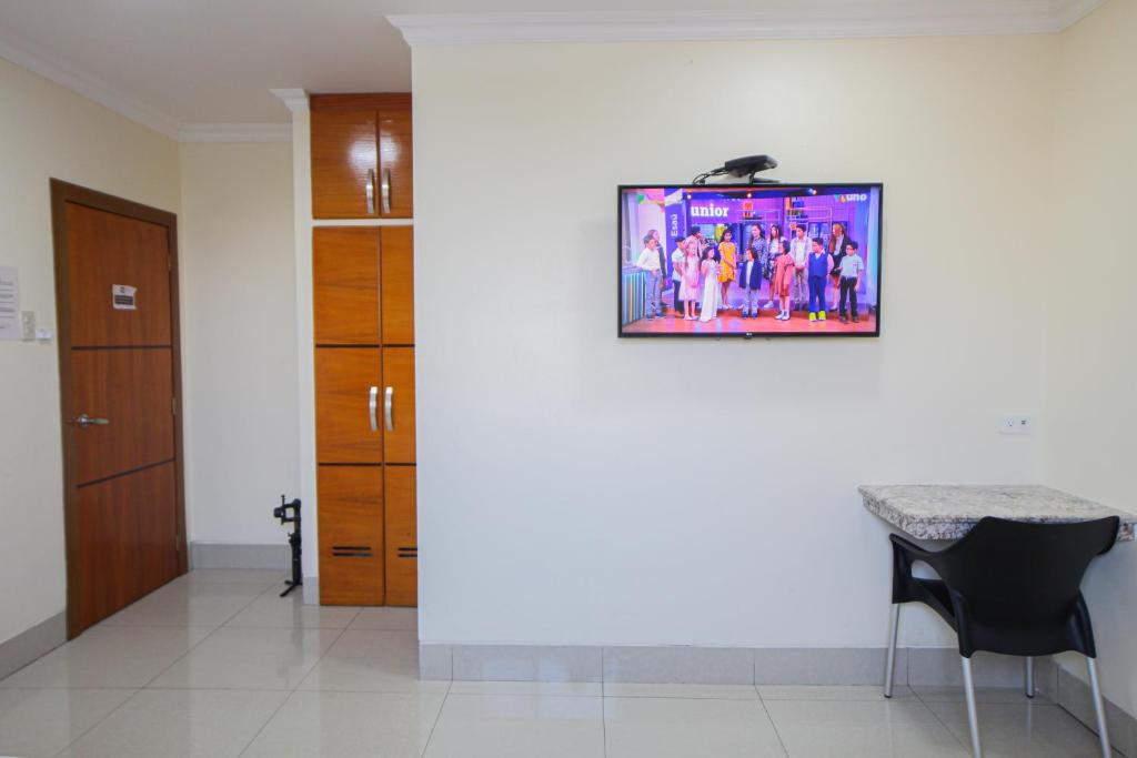 TV a/nebo společenská místnost v ubytování Hotel Murali - Cerca del Aeropuerto de Guayaquil