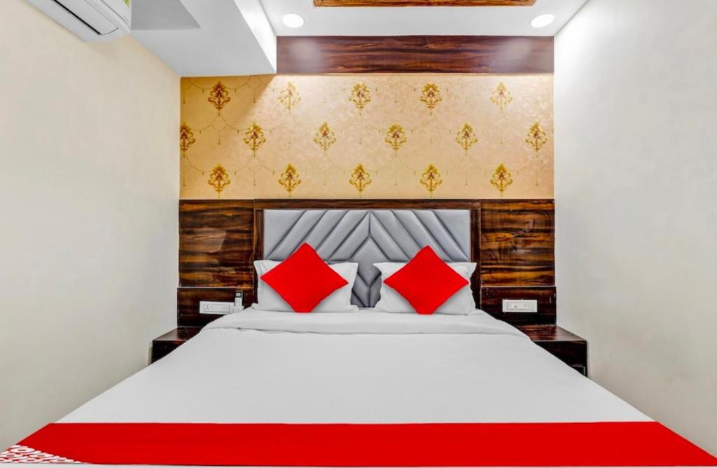 Tempat tidur dalam kamar di Hotel stay inn