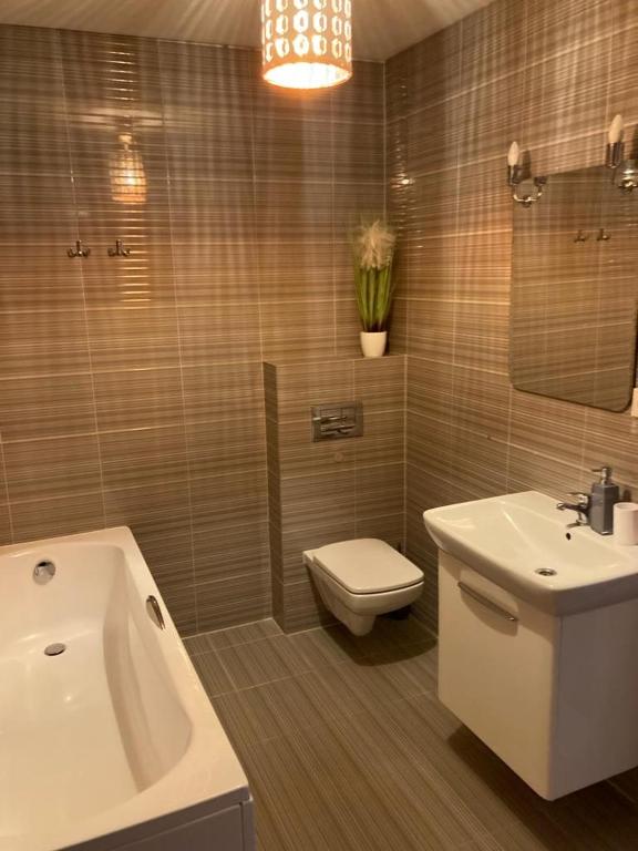 Kúpeľňa v ubytovaní Zajazd Stodoła sauna w cenie