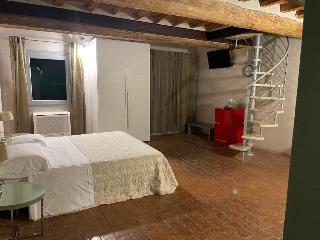 Postel nebo postele na pokoji v ubytování Agriturismo Albero del Latte