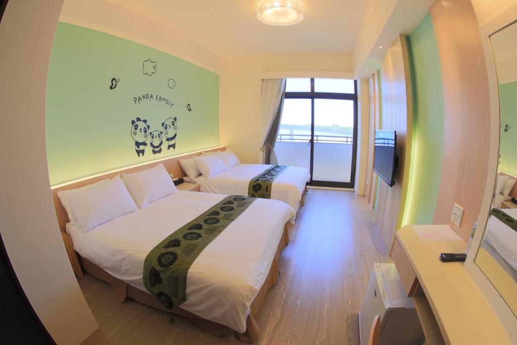 Postel nebo postele na pokoji v ubytování Luck Bay B&B