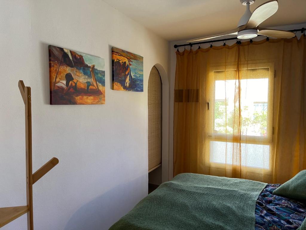 Postel nebo postele na pokoji v ubytování Casa Zizi