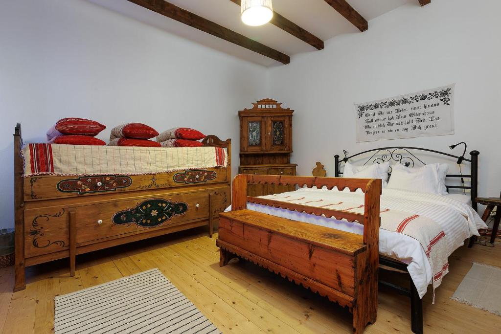 Postel nebo postele na pokoji v ubytování Viscri 44