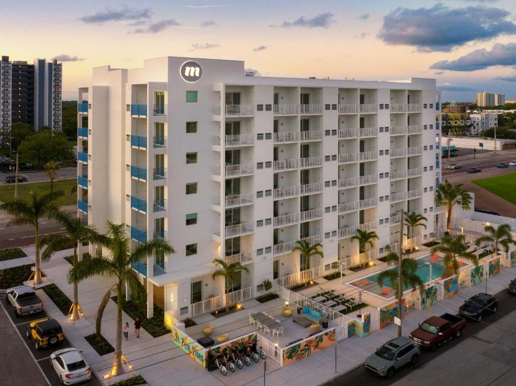 an aerial view of a hotel with a parking lot at Mint House St. Petersburg - Downtown in St Petersburg