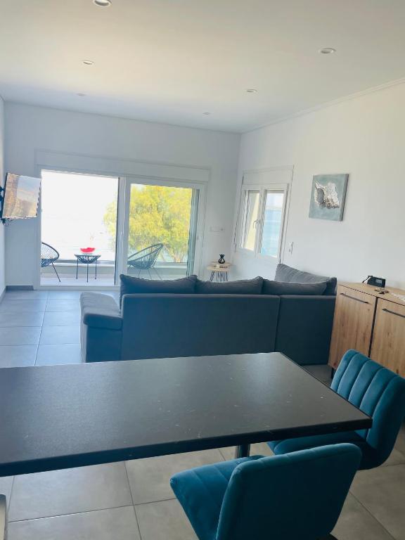 Kuchyň nebo kuchyňský kout v ubytování Seafront Apartment