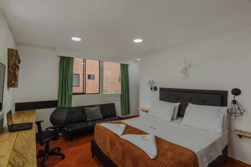 Postel nebo postele na pokoji v ubytování Casa Los Naranjos Hostal