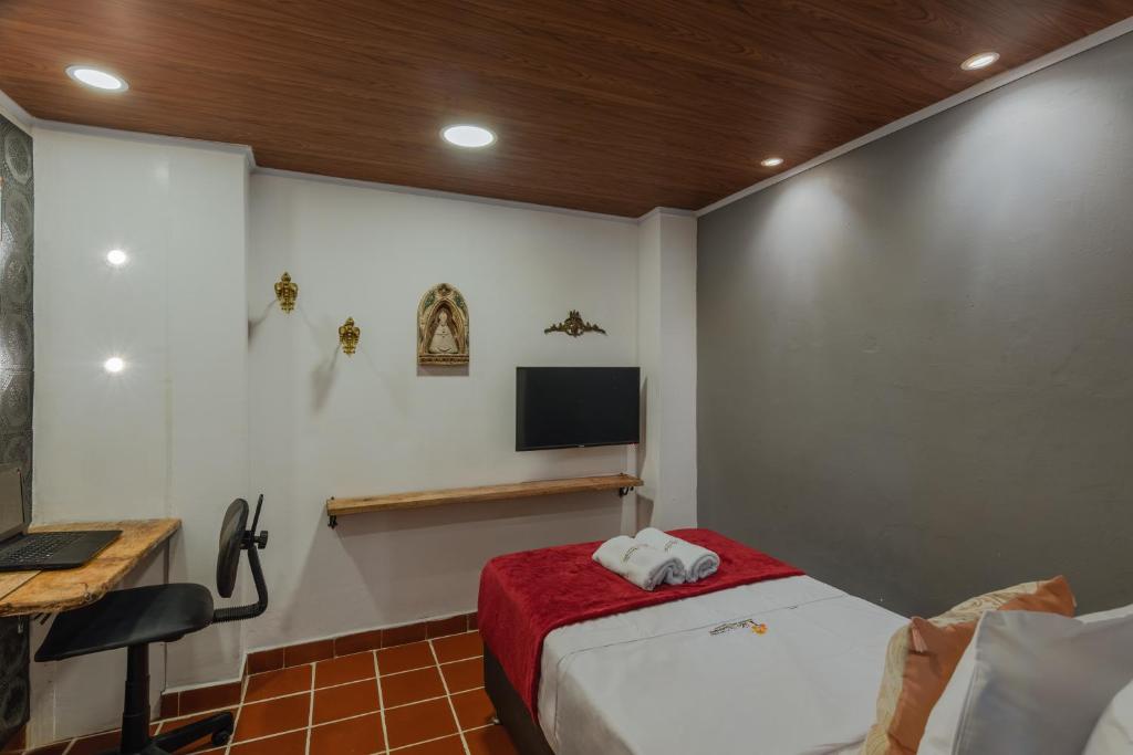 TV a/nebo společenská místnost v ubytování Casa Los Naranjos Hostal