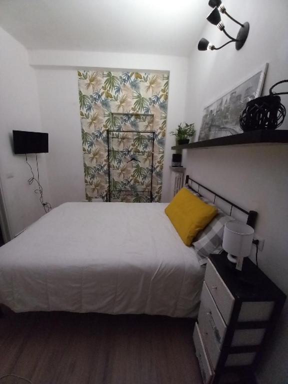 Postel nebo postele na pokoji v ubytování il cortile dei 3 camera matrimoniale