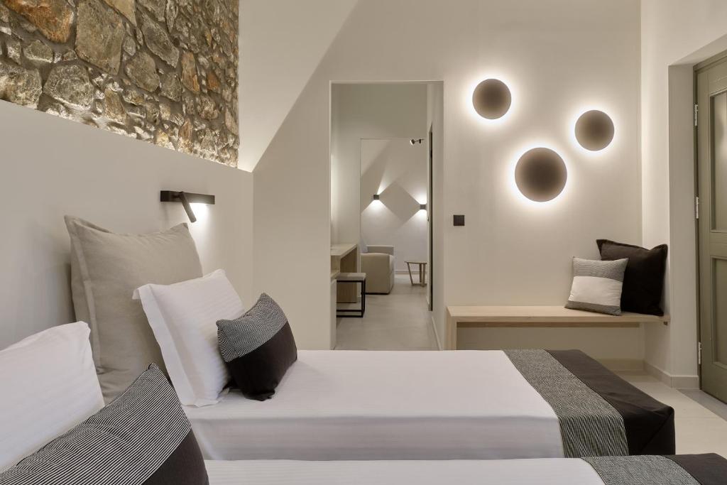 Postel nebo postele na pokoji v ubytování Zaira Hotel