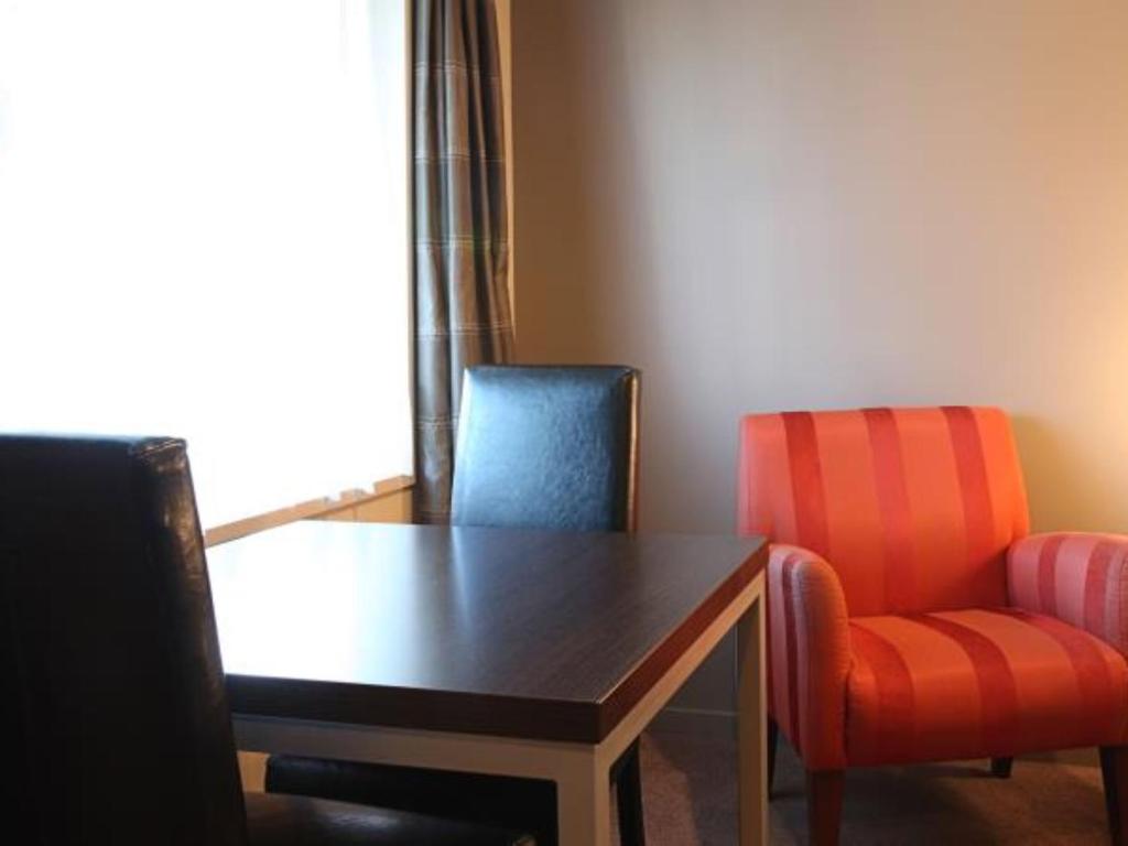 Posezení v ubytování 388 Tay Motel