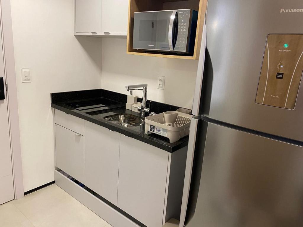 A cozinha ou cozinha compacta de Estilo Itacaré best location