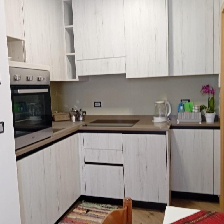 Kuchyň nebo kuchyňský kout v ubytování Casa Lucia