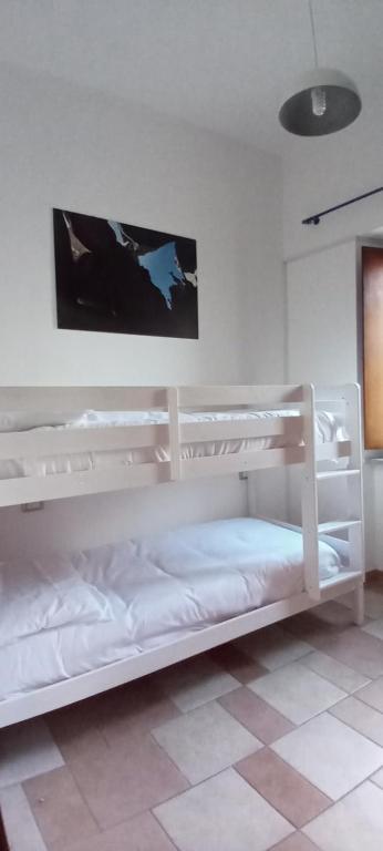 Postel nebo postele na pokoji v ubytování Casa Gonario