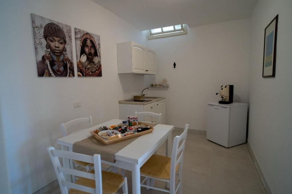 Kuchyň nebo kuchyňský kout v ubytování Lamapulia