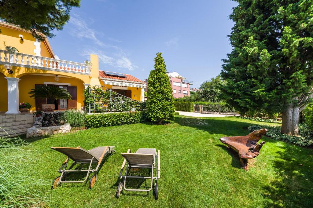 Vonkajšia záhrada v ubytovaní Apartments Stana