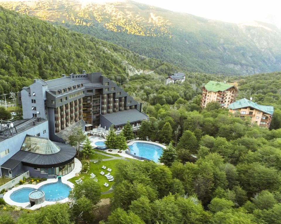 an aerial view of a hotel in the mountains at Hotel Termas Chillán in Nevados de Chillan
