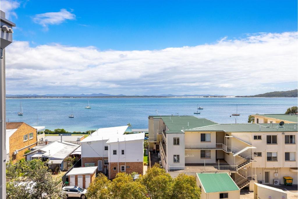 a view of a city with a body of water at The Shoal, 508, Bullecourt St - stunning views, air con, lift and Wi-Fi in Shoal Bay