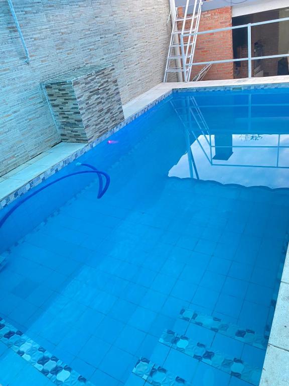 Bazén v ubytování Apartamento entero en Caacupé. nebo v jeho okolí